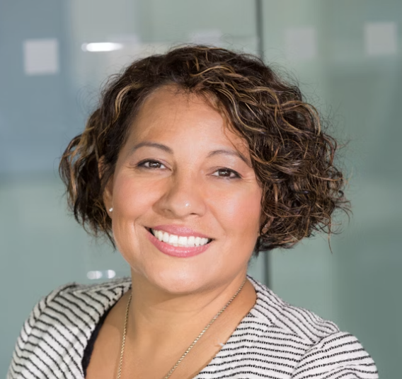 Woman smiling in striped shirt
